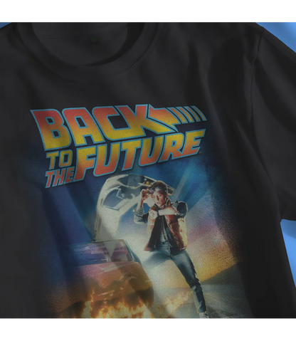 Close up of Unisex short sleeve black t-shirt featuring official Back To The Future iconic logo movie poster design with Marty / Retro Tees