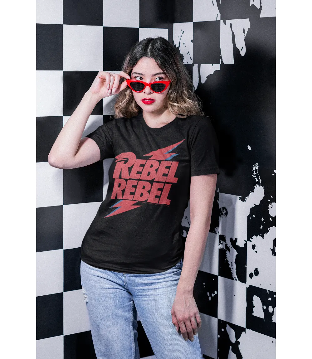 Woman wearing Unisex short sleeve black t-shirt featuring official David Bowie design, Rebel Rebel red Text with iconic lightning bolt behind in red and blue / Retro Tees