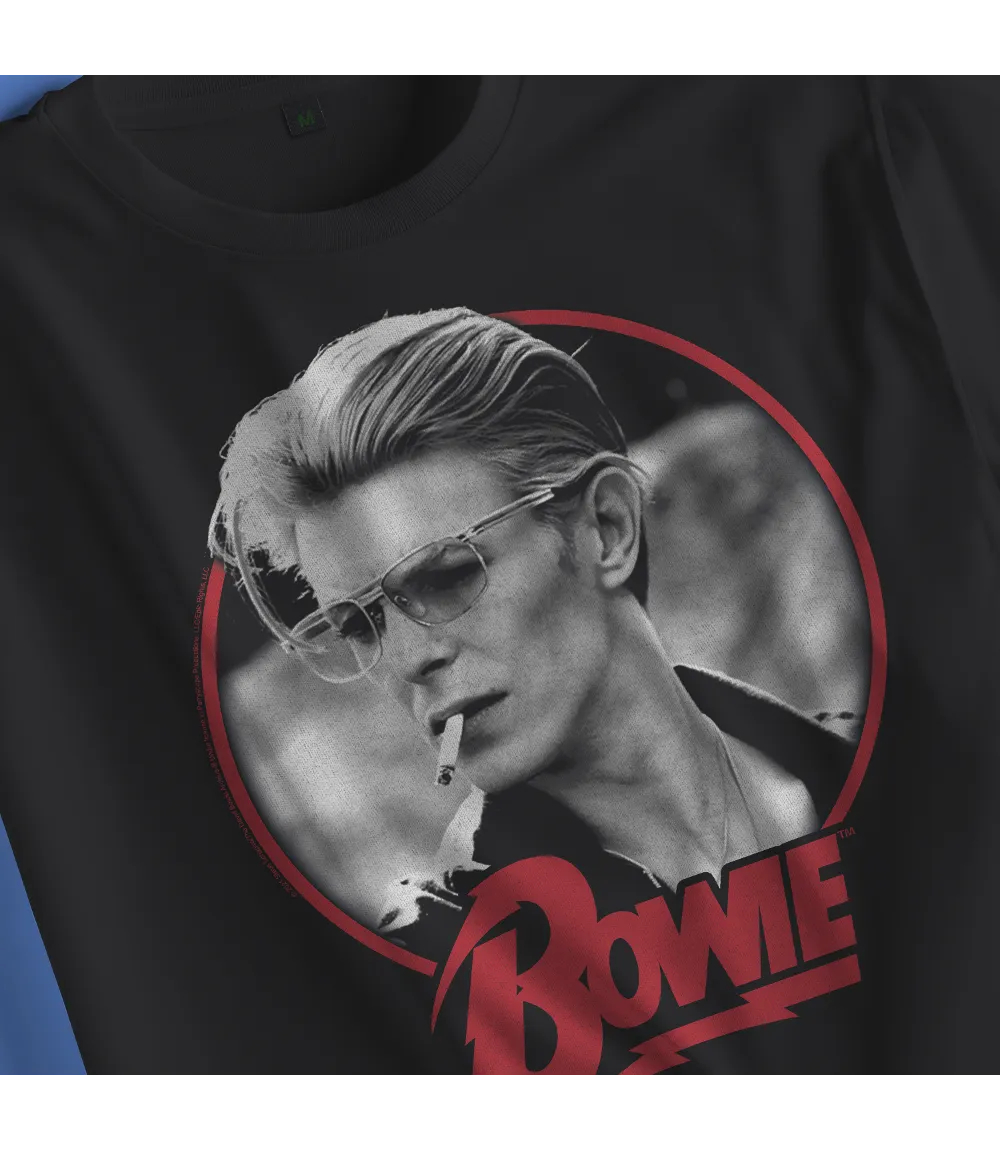 Close up of Unisex short sleeve black t-shirt featuring official David Bowie smoking portrait design with Bowie text in red below / Retro Tees