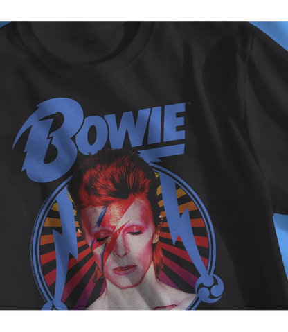 Close up of Unisex short sleeve black t-shirt featuring official David Bowie Ziggy Stardust Flash portrait design with Bowie text in blue above / Retro Tees