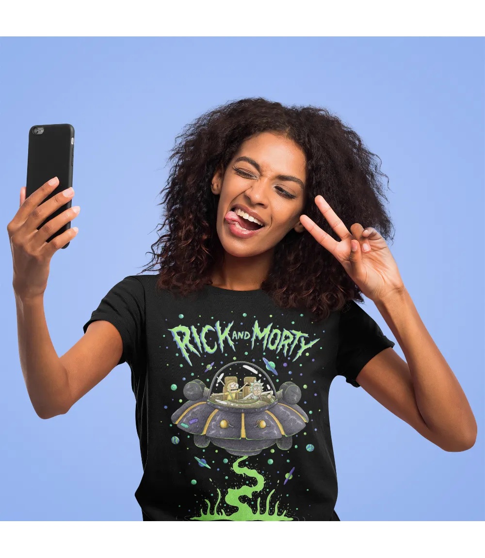 Woman wearing Unisex short sleeve black t-shirt featuring official Cartoon Network Rick and Morty in their space ship design with Rick and Morty text / Retro Tees