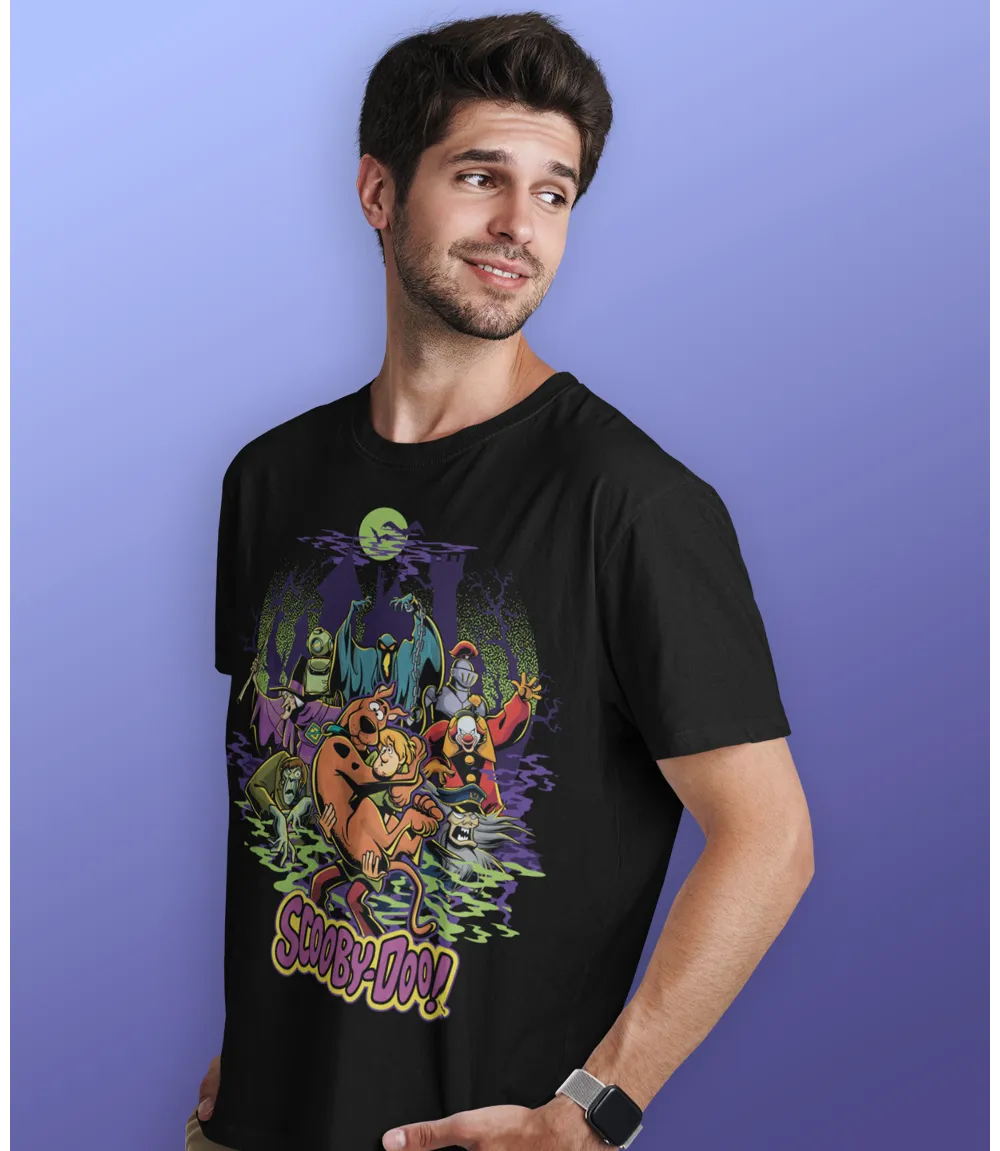 Man wearing Unisex short sleeve black t-shirt featuring official Warner Bros Scooby-Doo villans poster design with the all important Scooby and Shaggy taking center stage / Retro Tees