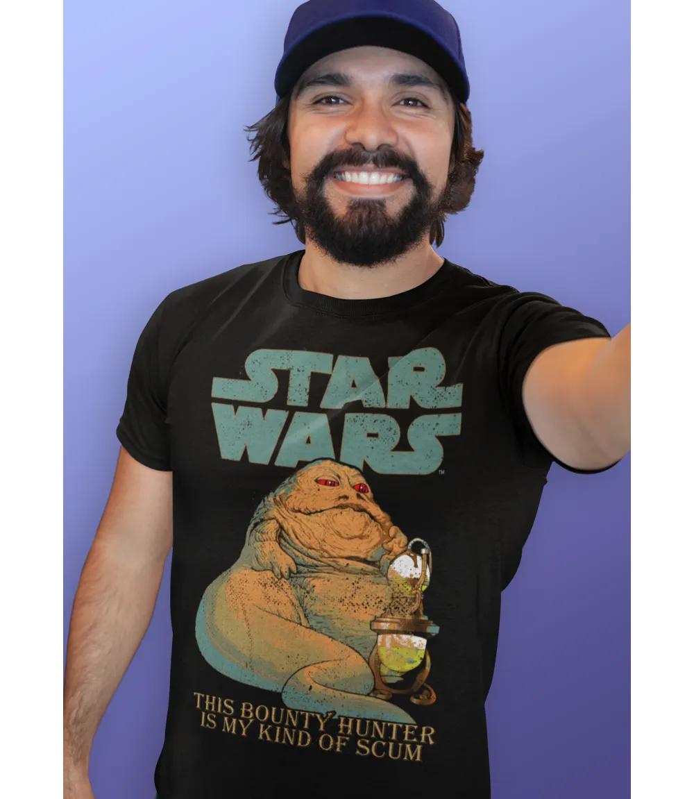 Man wearing Unisex short sleeve black t-shirt featuring official Star Wars Jabba The Hutt poster vintage Design with Star Wars text above and This Bounty Hunter Is My Kind Of Scum text below / Retro Tees