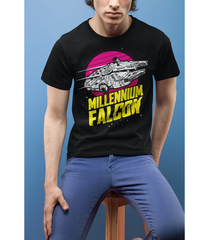 Man wearing Unisex short sleeve black t-shirt featuring official Star Wars movie Millennium Falcon in flight in Black and white on a pink/red circle planet design with Millennium Falcon text in yellow below / Retro Tees
