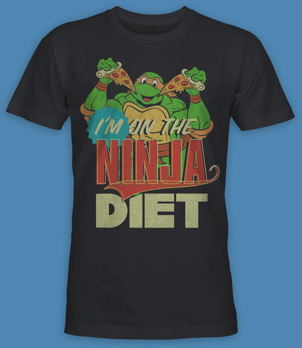 Unisex short sleeve black t-shirt featuring official Teenage Mutant Ninja Turtles Michelangelo with pizza design with I'm on the Ninja Diet text / Retro Tees
