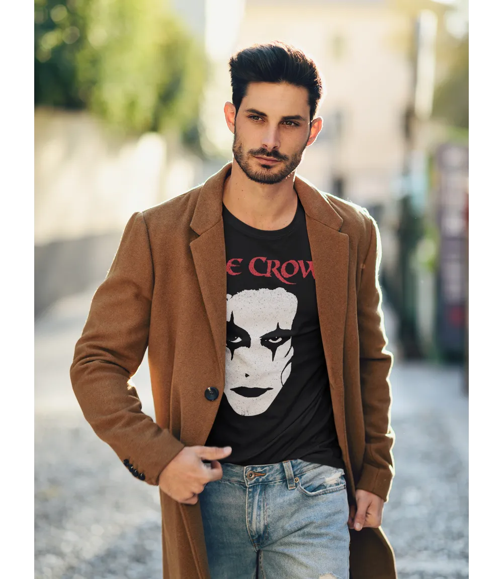 Man wearing Unisex short sleeve black t-shirt featuring official 90s movie The Crow Brandon Lee Face design / Retro Tees