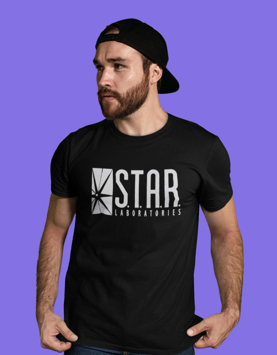 Man wearing Retro tees black short sleeve men's unisex t-shirt featuring Star Laboratories text and logo in white